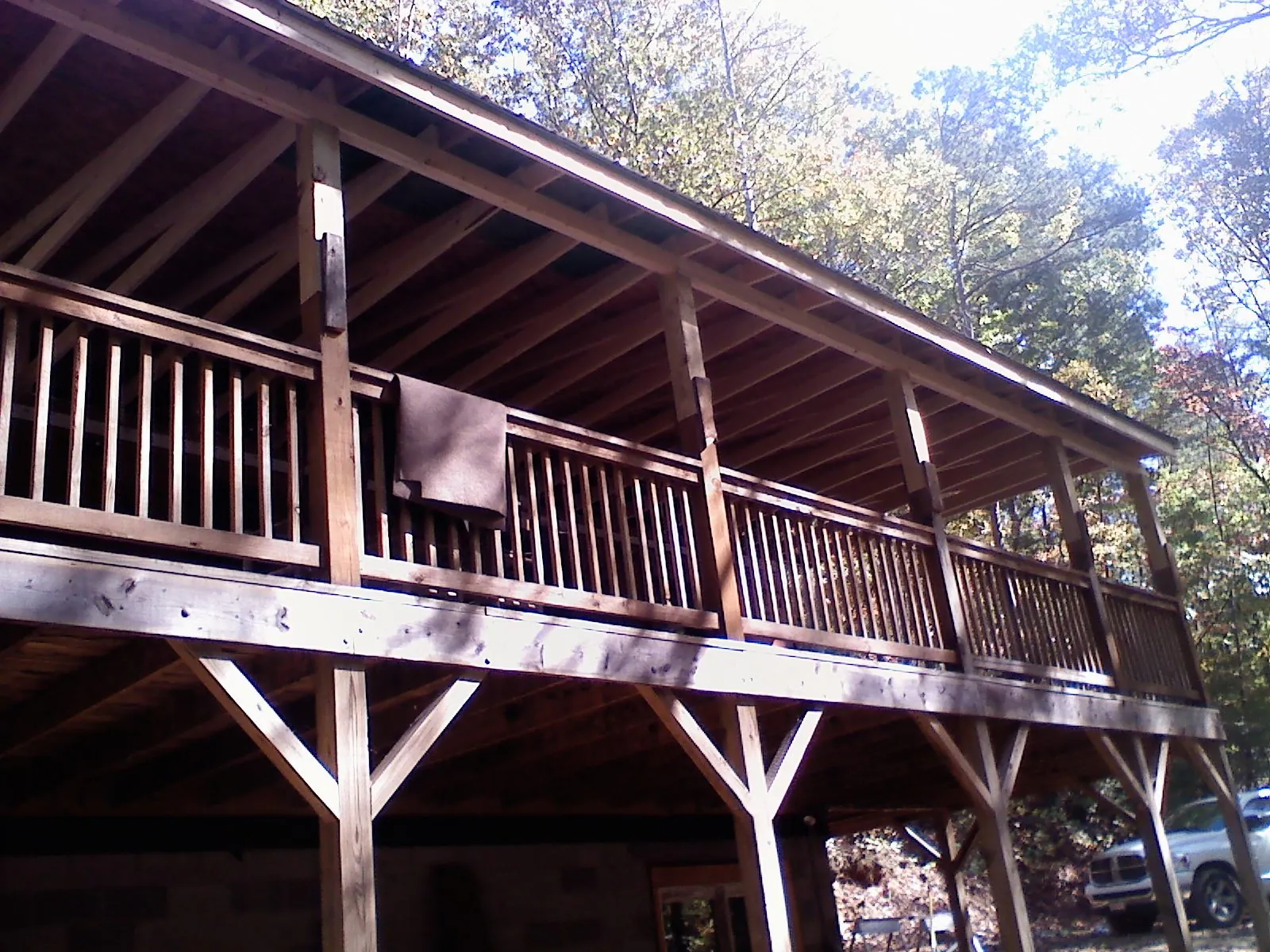 Timber framing under a new elevated porch and deck — Roof Leak Repair in Browning by Roofing Brothers